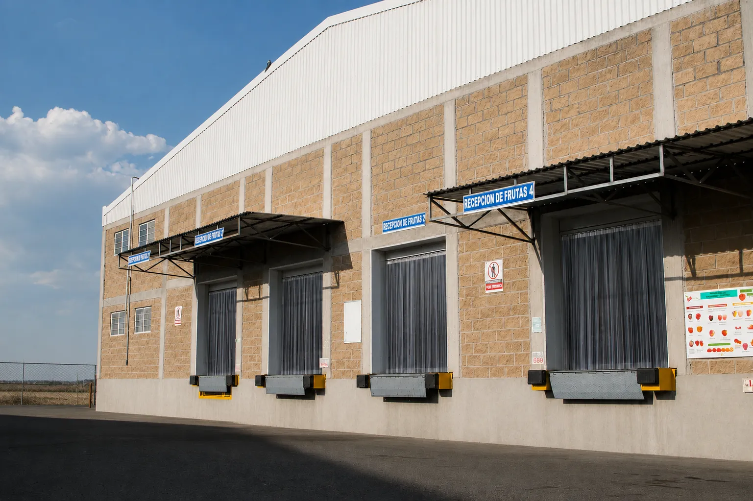 Fruit receiving docks on the facade of the Bonum plant.